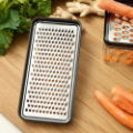 Rig-tig grate it grater with container